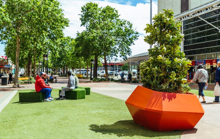 People sitting on a bench outdoors