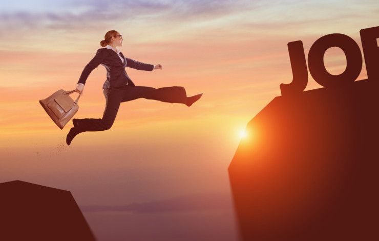 person jumping over to the word job