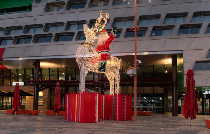santa riding a reindeer