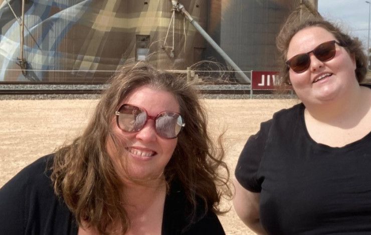 Two women smiling