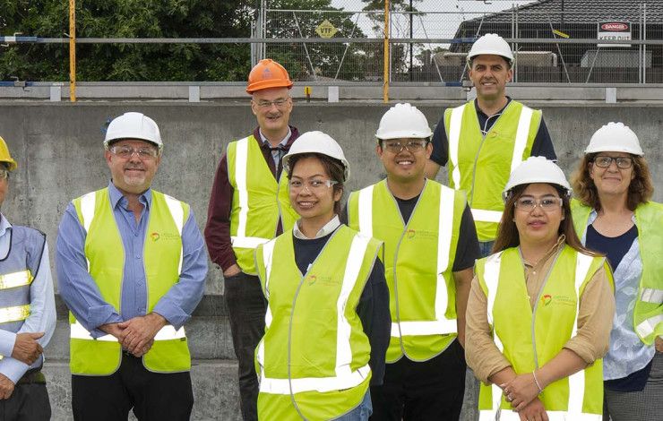 Councillors standing at the Dandenong Wellbeing worksite