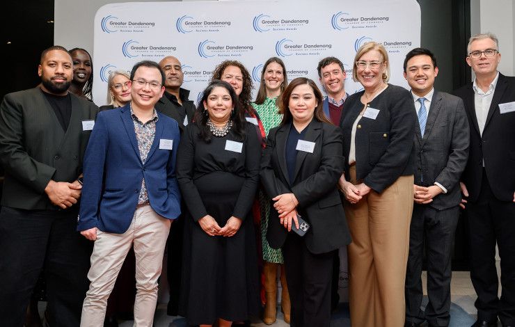 Staff smiling at a Business Awards night