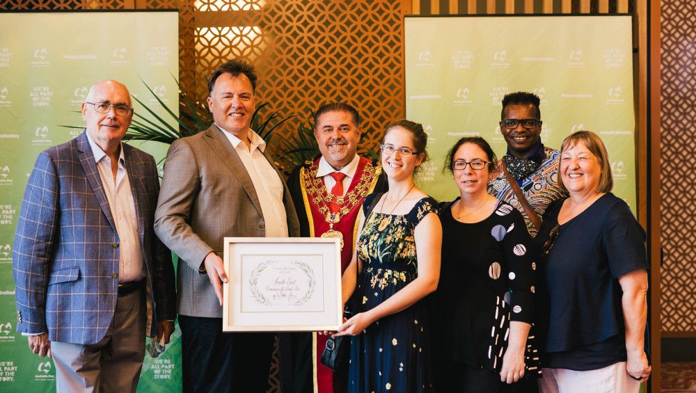 photo of group receiving an award