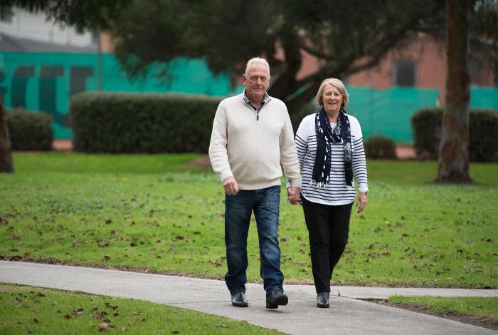 Couple walking in a park