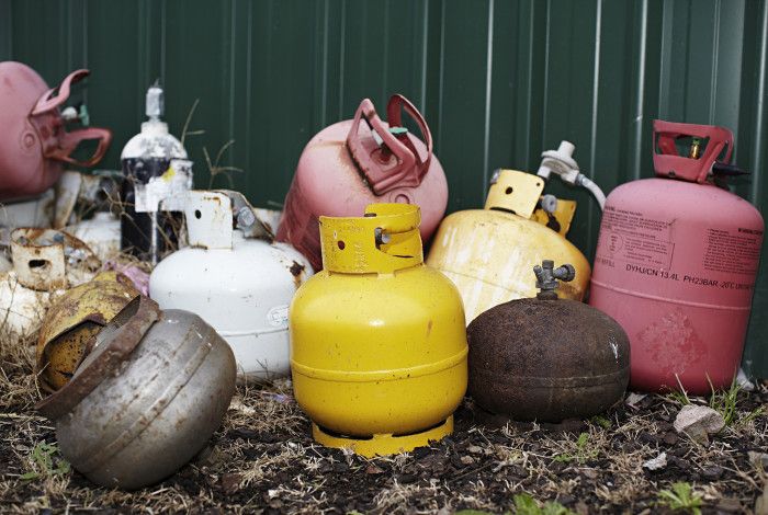 discarded gas bottles