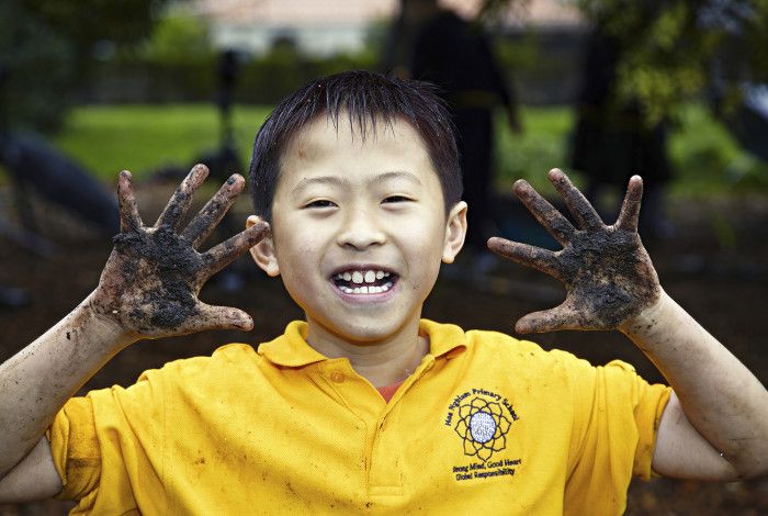 boy with dirty hands
