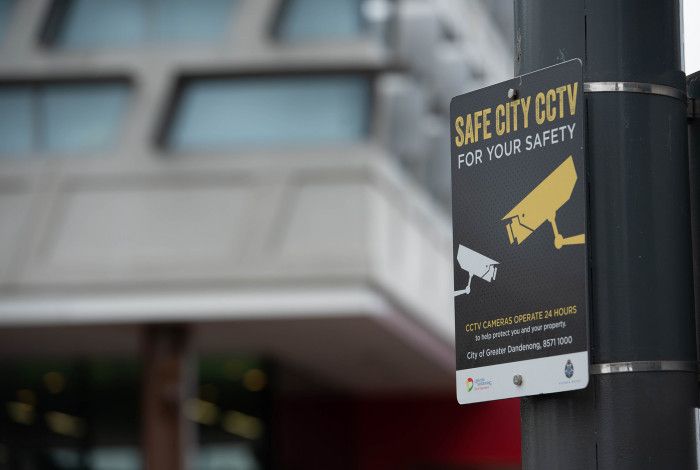 CCTV sign on a pole