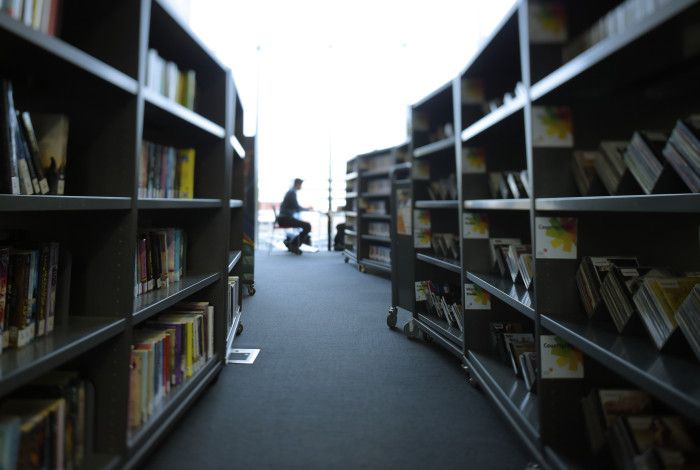 Image: Man sitting reading