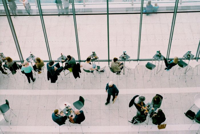 Aerial view of people gathering in a foyer 