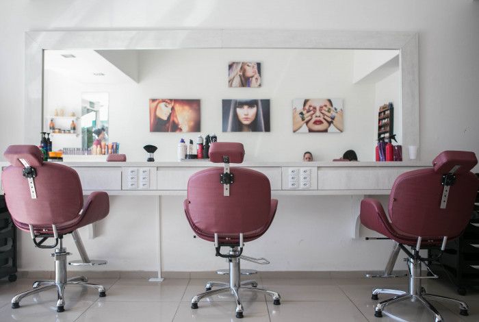 Hairdresser's chairs and mirror set up