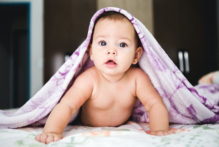 Baby under a blanket