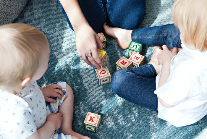 Children doing an activity on the floor