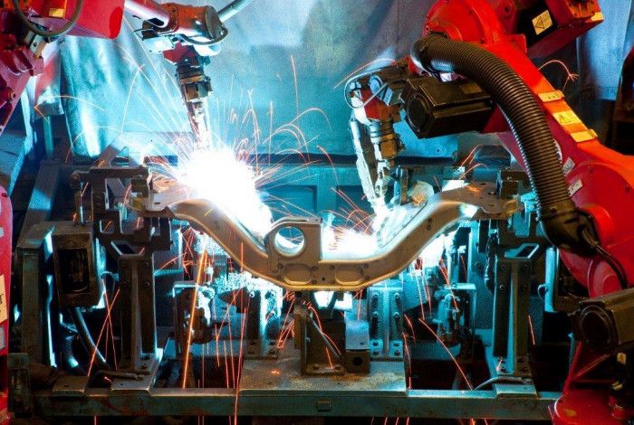 robots welding a component 