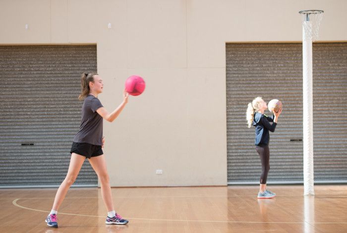 Girls playing netball