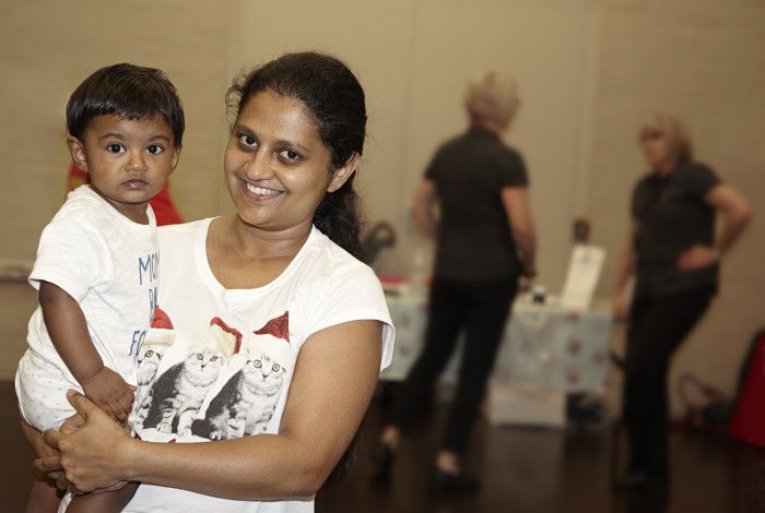 child and mother at immunisation session
