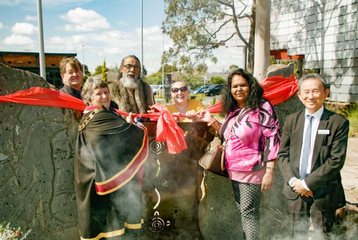 Ribbon cutting at unveiling 