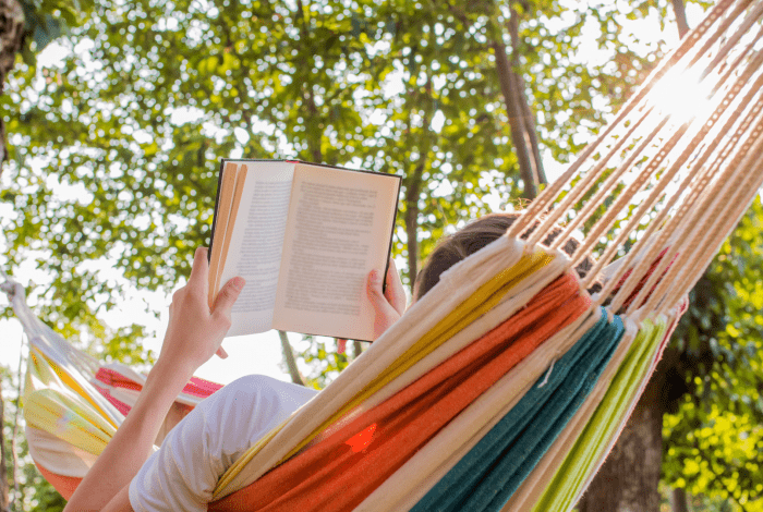 Person reading in a hammock