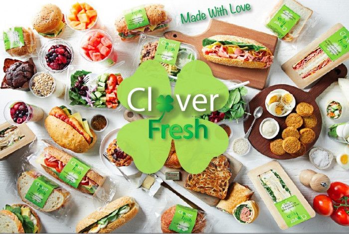 Clover Fresh logo with food items in the background