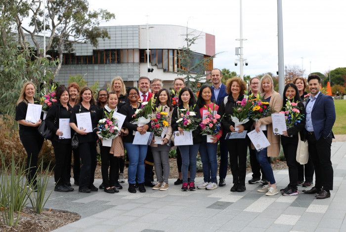 Mayor Jim Memeti with a large group of graduates Council workers.