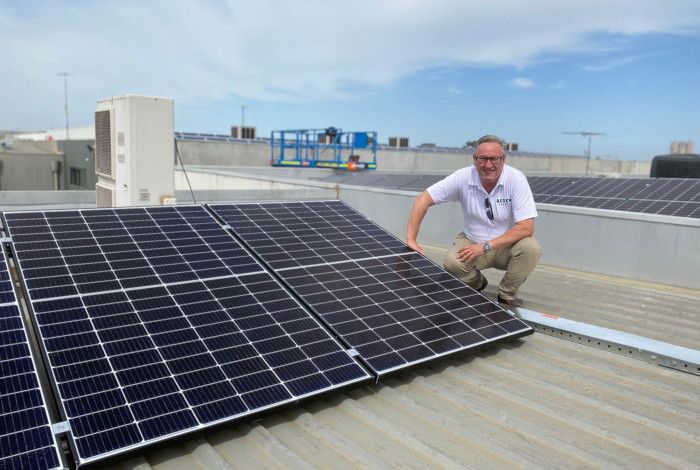 Man with solar panels