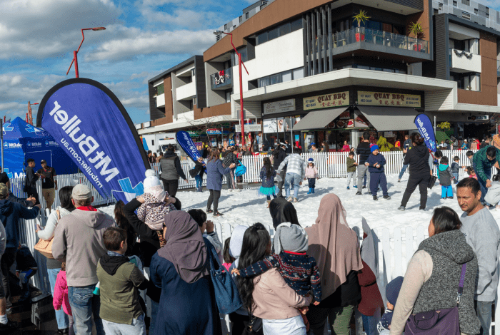 Crowds enjoying playing in the snow at Snow Fest 2019. 