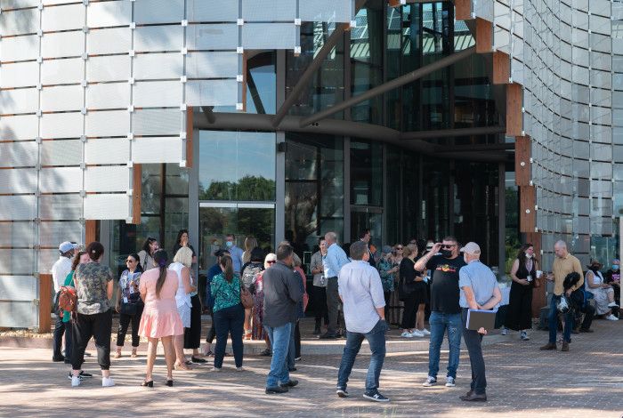 People gathering outside the Hub for an event