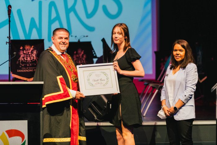 image of girl receiving an award from mayor