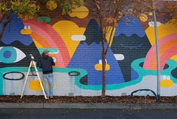 a colourful mural on a wall