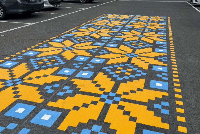 yellow and blue painted mural on road