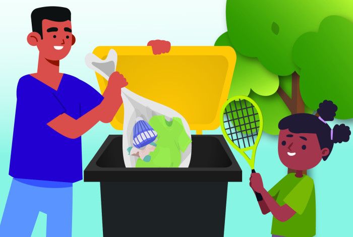 Man putting bag of clothes in bin
