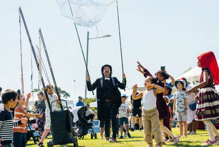 a roving performer at the Noble Park Fun Day 