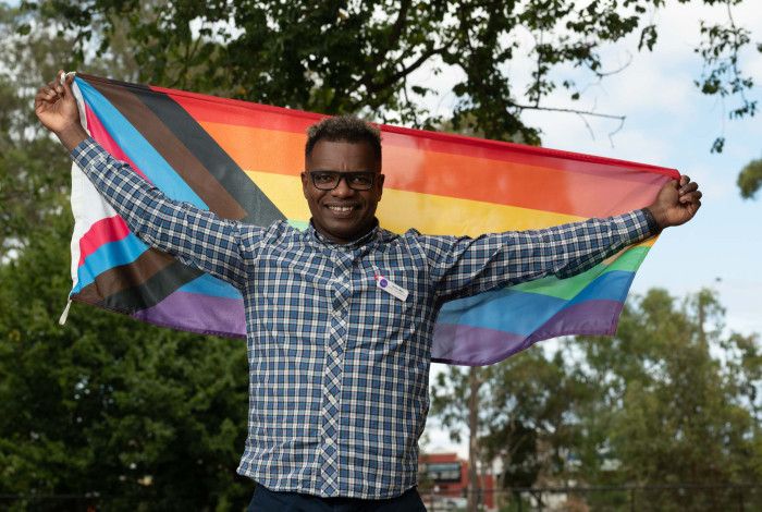 Proud ally Junior Melo flies the rainbow flag