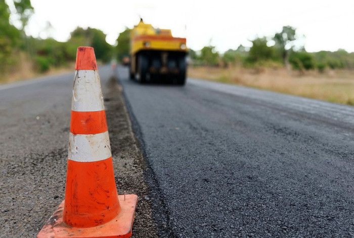 Construction of a road with a safety cone