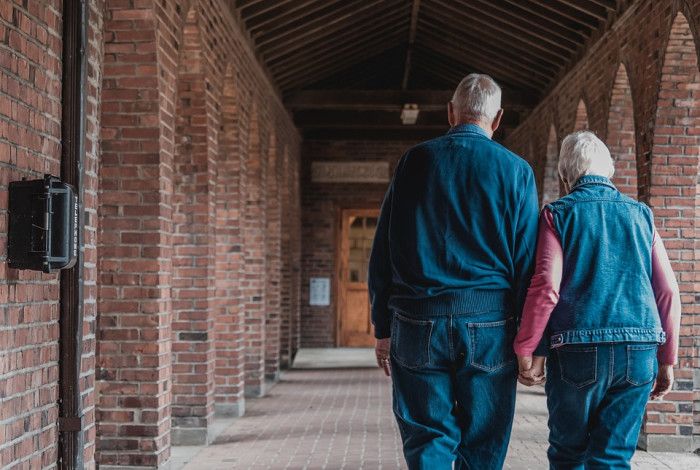 Older couple walking together