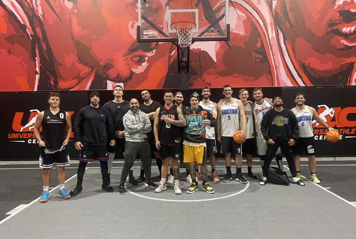 a group of people on a basketball court