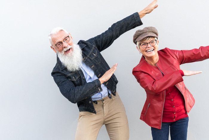 Two seniors, a man and a woman, dancing