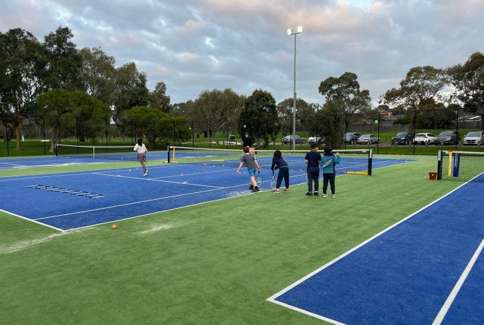 People playing tennis