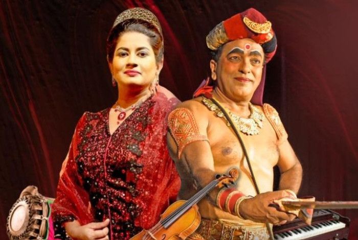 two people playing Sri Lankan instruments