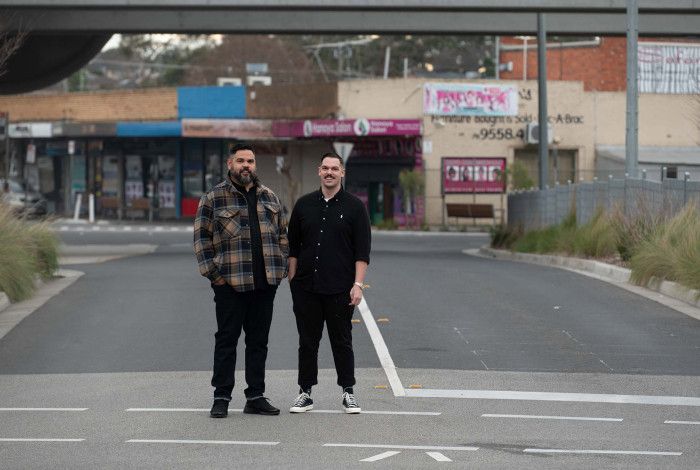 Muderra Way with two men