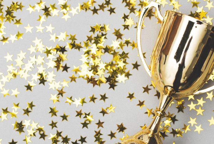 Gold trophy and stars. 
