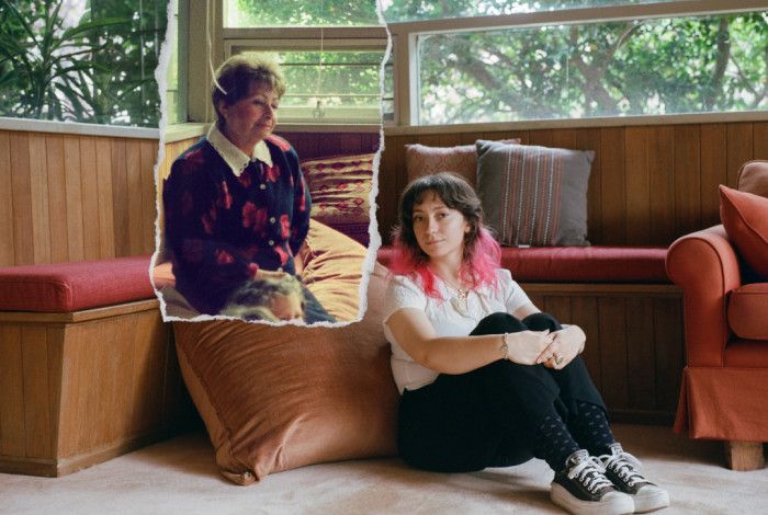 Two ladies sitting down