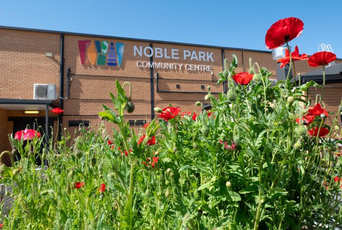 A building with flowers in the front