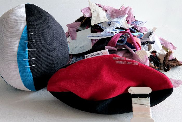 Two fabric footballs and assorted fabrics.