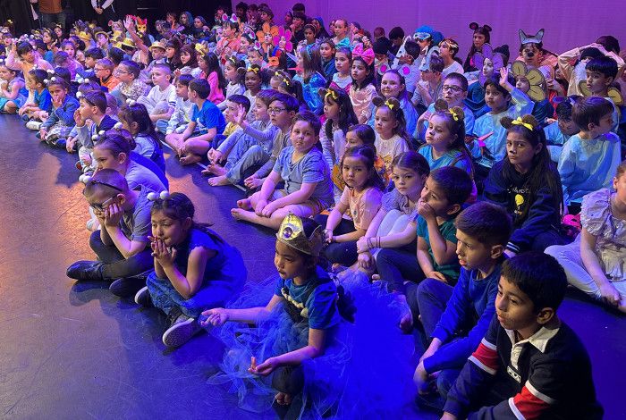 Students sitting on the floor