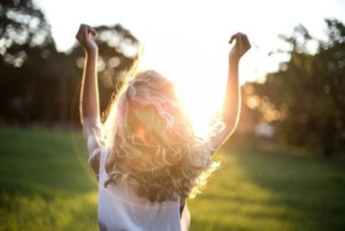 Lady with arms in the air