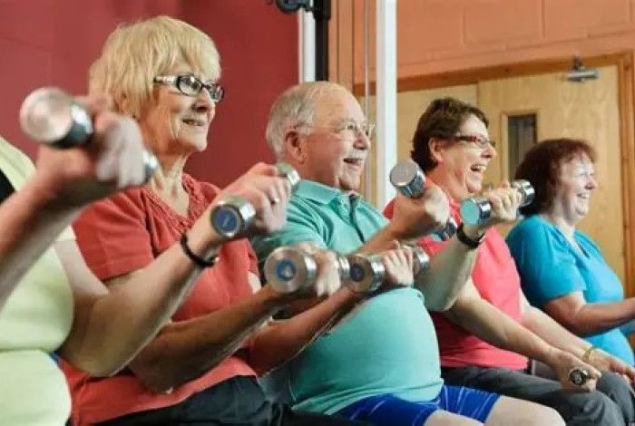 seniors seated exercising 