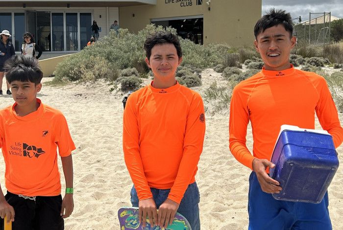 Young people smiling at the beach