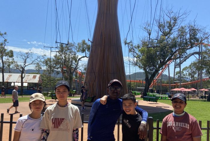 Group of young people smiling at Gumbuya World