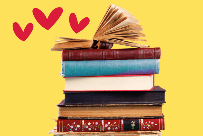 Colourful books piled against yellow background surrounded by red love hearts.