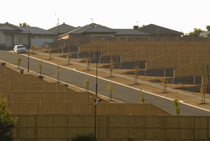 Photo from the bottom of a hill overlooking an estate.